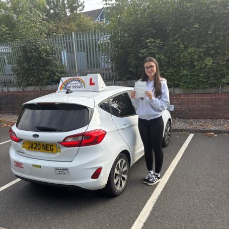 Pupil celebrating a driving achievement